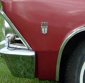 230 L6 fender emblem